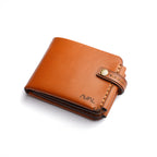 The Monarch 10-Slot Traveler trifold wallet, secure coin slot close-up, bucket cash slot, classic tanned leather