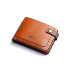 Brown leather wallet with visible brand logo on a white background tan vs black leather bifold, executive style wallet, modular card holder, signature style luxury statement