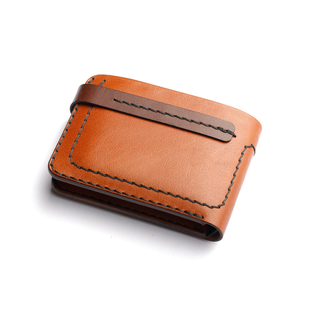 back side view of The Nexus Dual-Tone Split-Carry Bifold in TAN VS BLACK leather, showcasing its striking color contrast and premium finish.