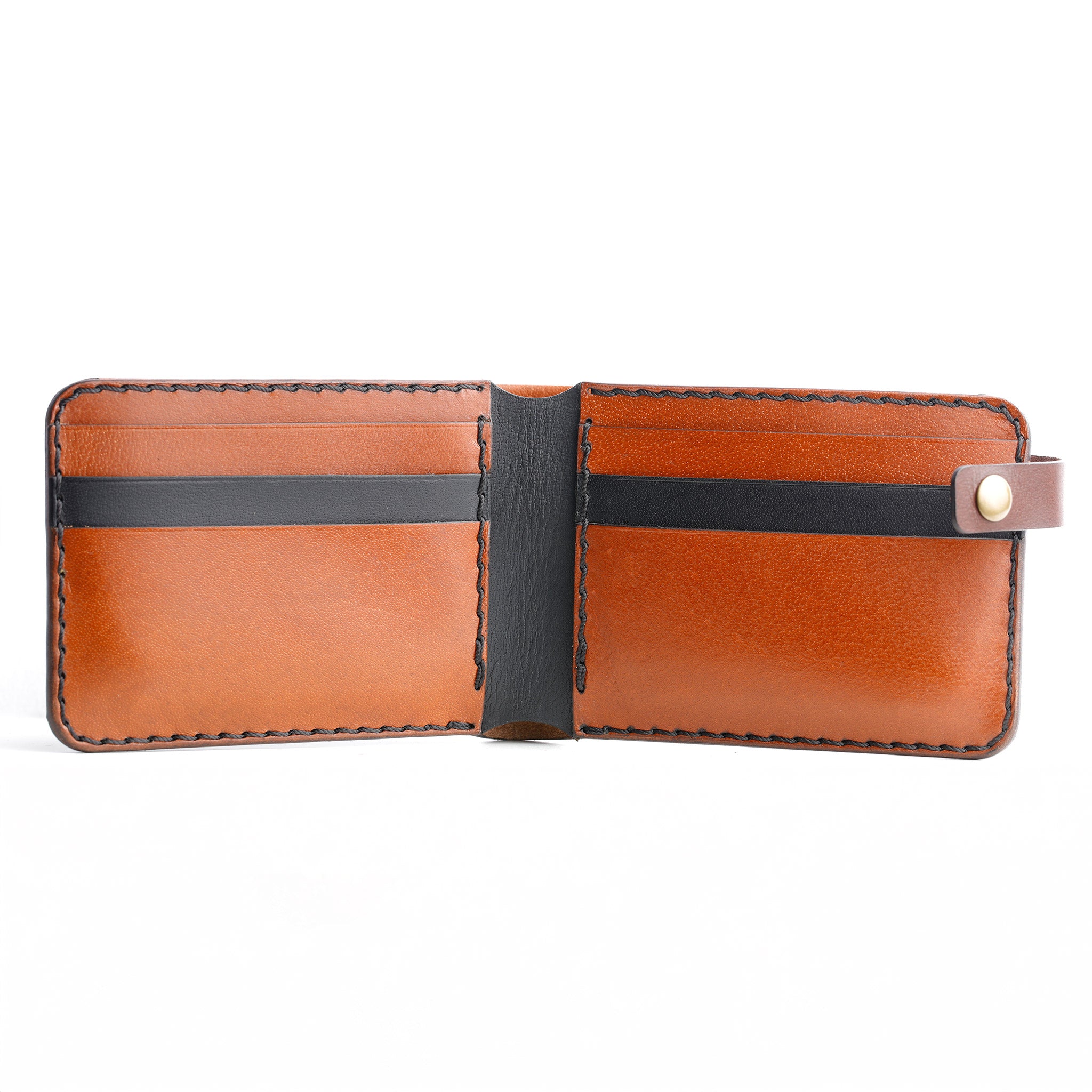  An interior view of The Nexus leather bifold, highlighting the 12+ card capacity and the inner card holder slot.