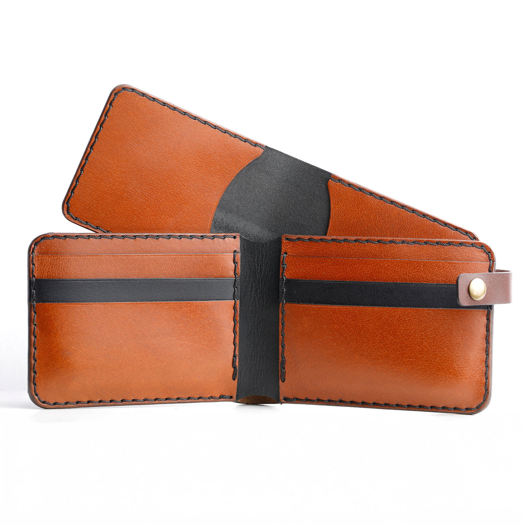 An interior view of The Nexus leather bifold, highlighting the 12+ card capacity and the inner card holder slot. 12-plus card capacity wallet, slim leather bifold, front pocket friendly, handmade leather goods