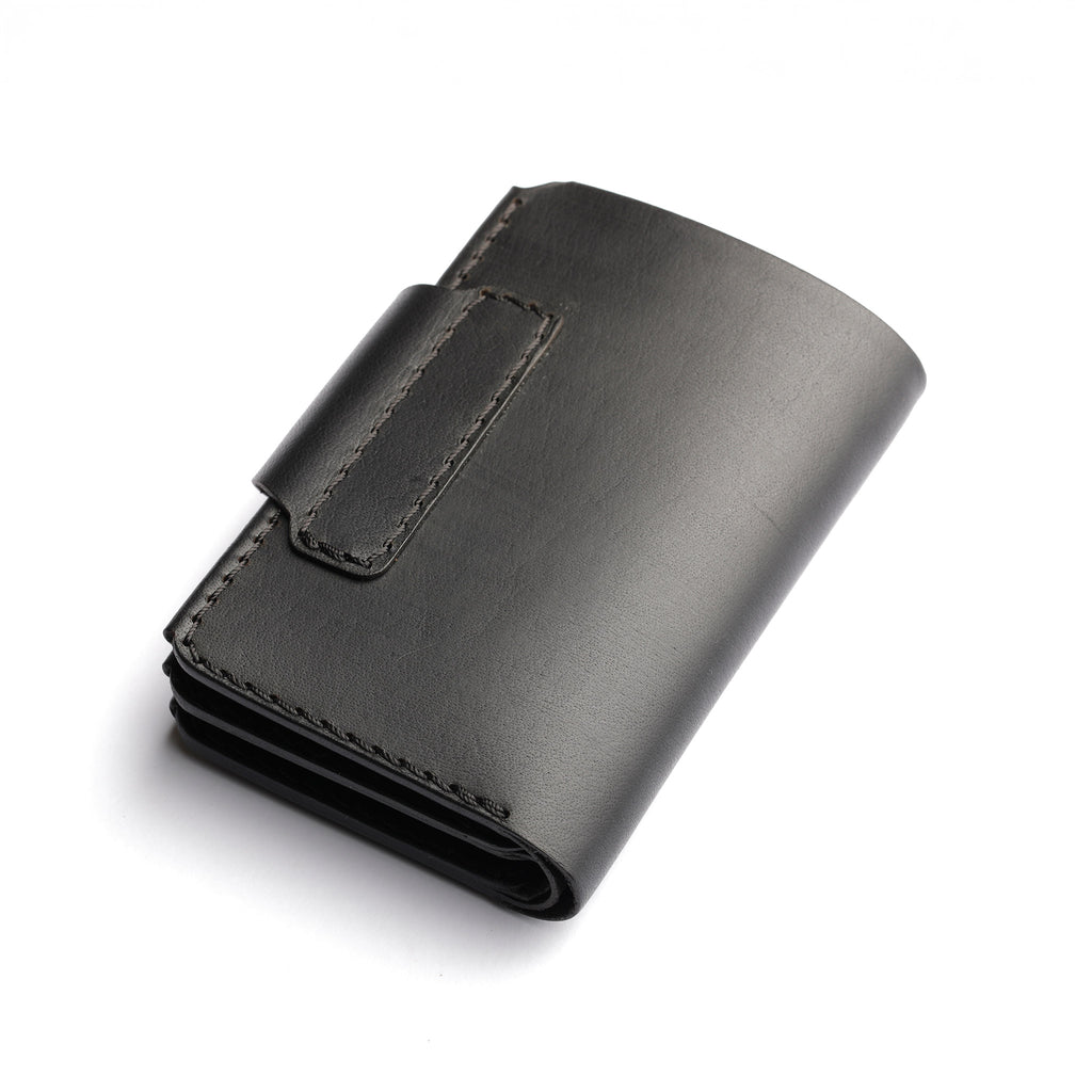 back side view of minimalist black wallet for men, single color leather, sleek accessory