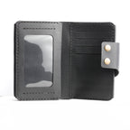 An interior view of the Maverick 2.2 leather wallet, highlighting the clear ID window and multiple card slots