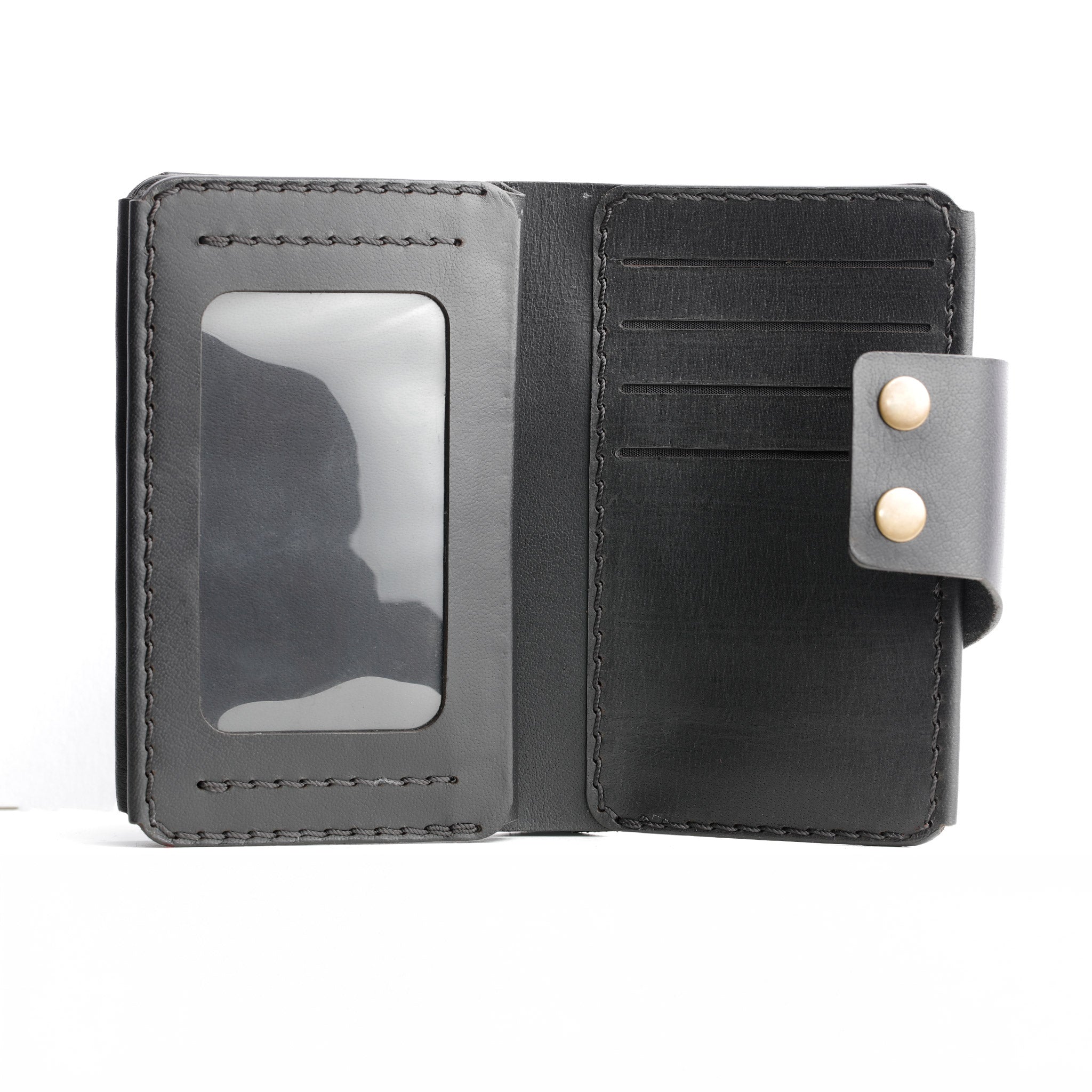 An interior view of the Maverick 2.2 leather wallet, highlighting the clear ID window and multiple card slots