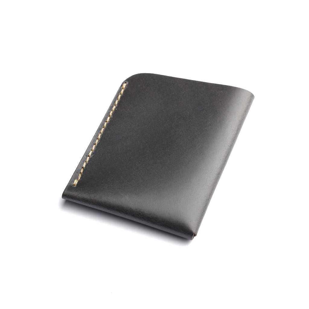 Black leather wallet with gold stitching on a white backgroun