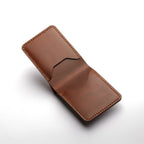 An open view of the grey leather wallet, showing its interior