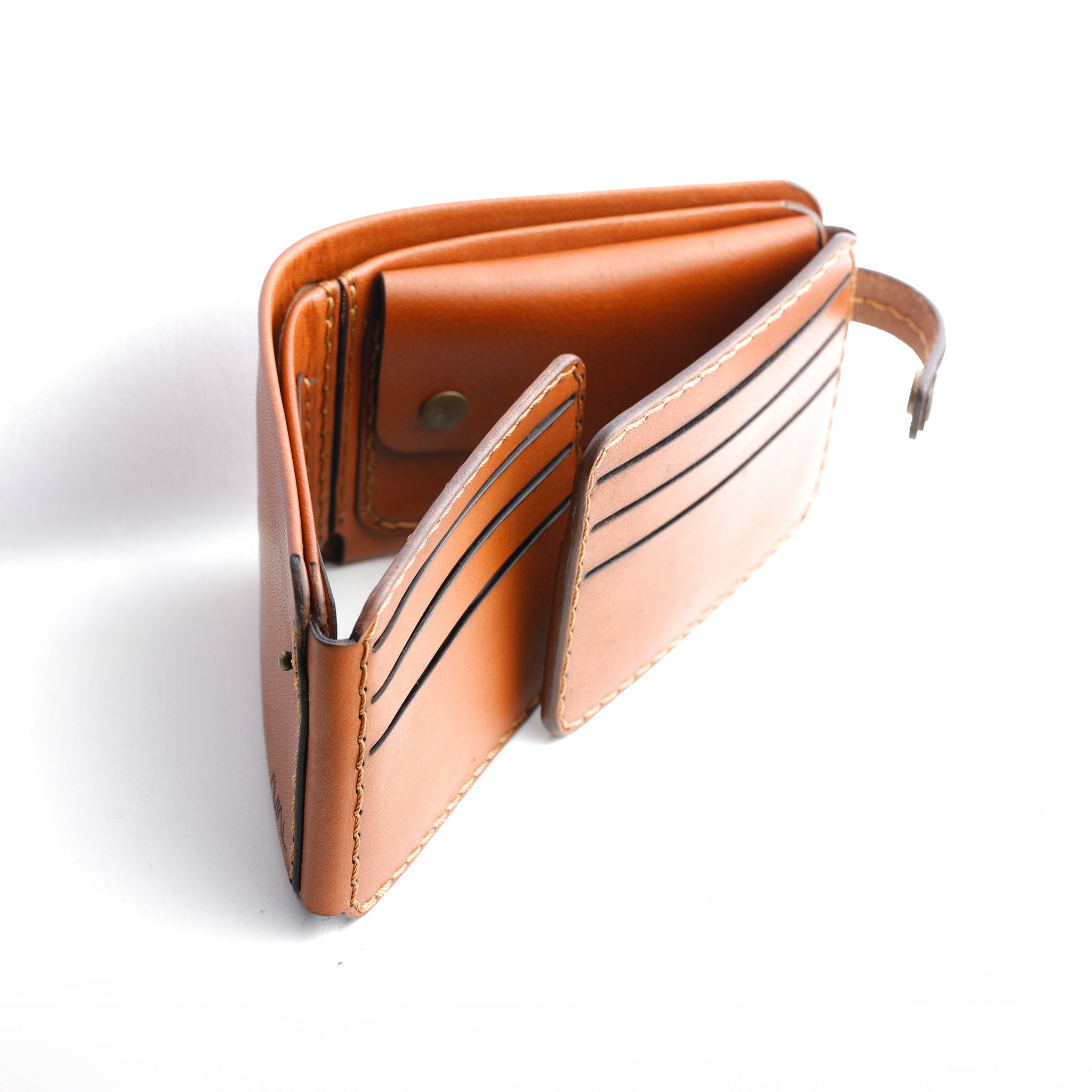 top view of The Monarch 10-Slot Traveler open view, interior organization, 10 card slots, classic tanned leather lining