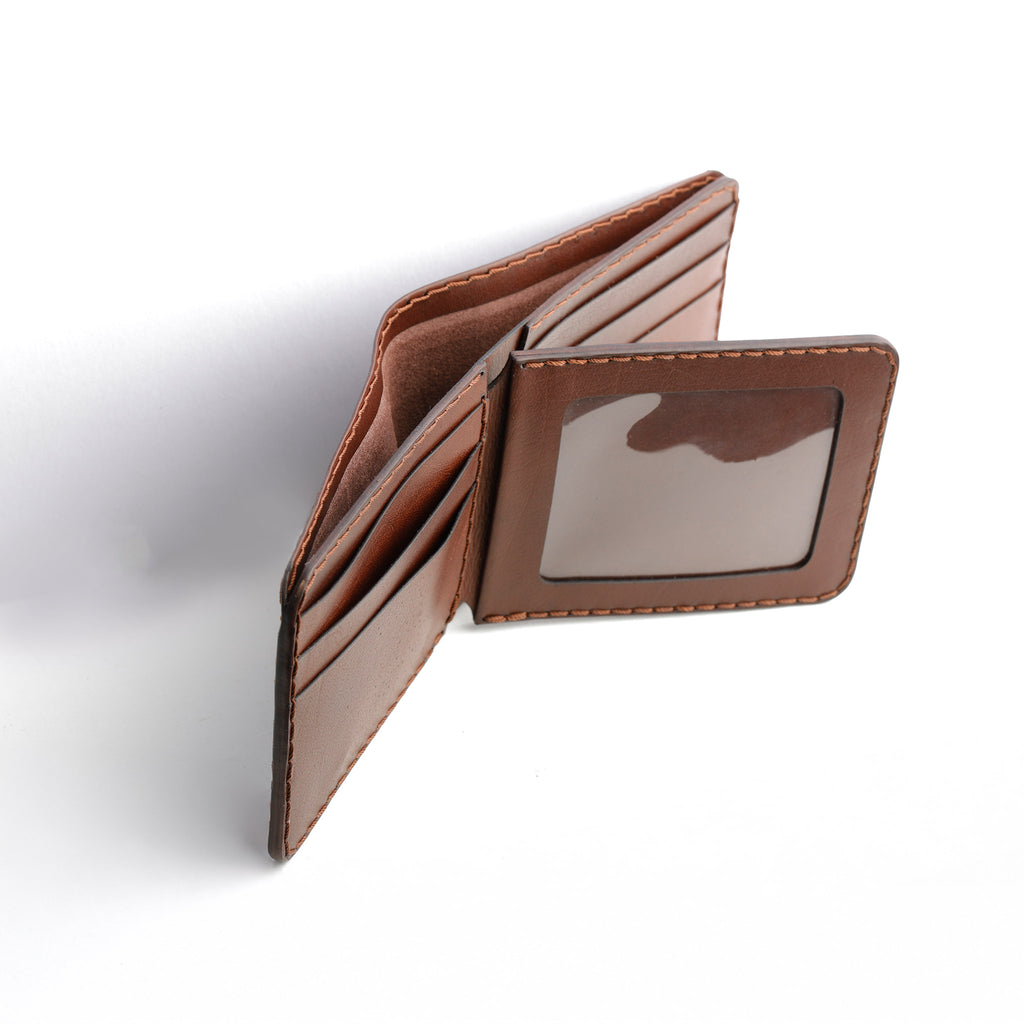 A detailed photo of the bifold wallet open, showing a cash compartment and multiple card slots ready for use