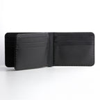 A close-up front view of the Black Luxury Bifold Three-Layer Leather Wallet, showcasing its rich texture.