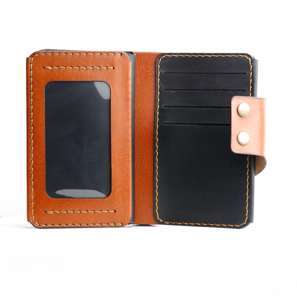 An interior view of the Maverick 2.1 leather wallet, highlighting the clear ID window and multiple card slots.