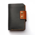 A close-up shot of the front of the Maverick 2.1 dual-tone wallet, emphasizing its unique color combination