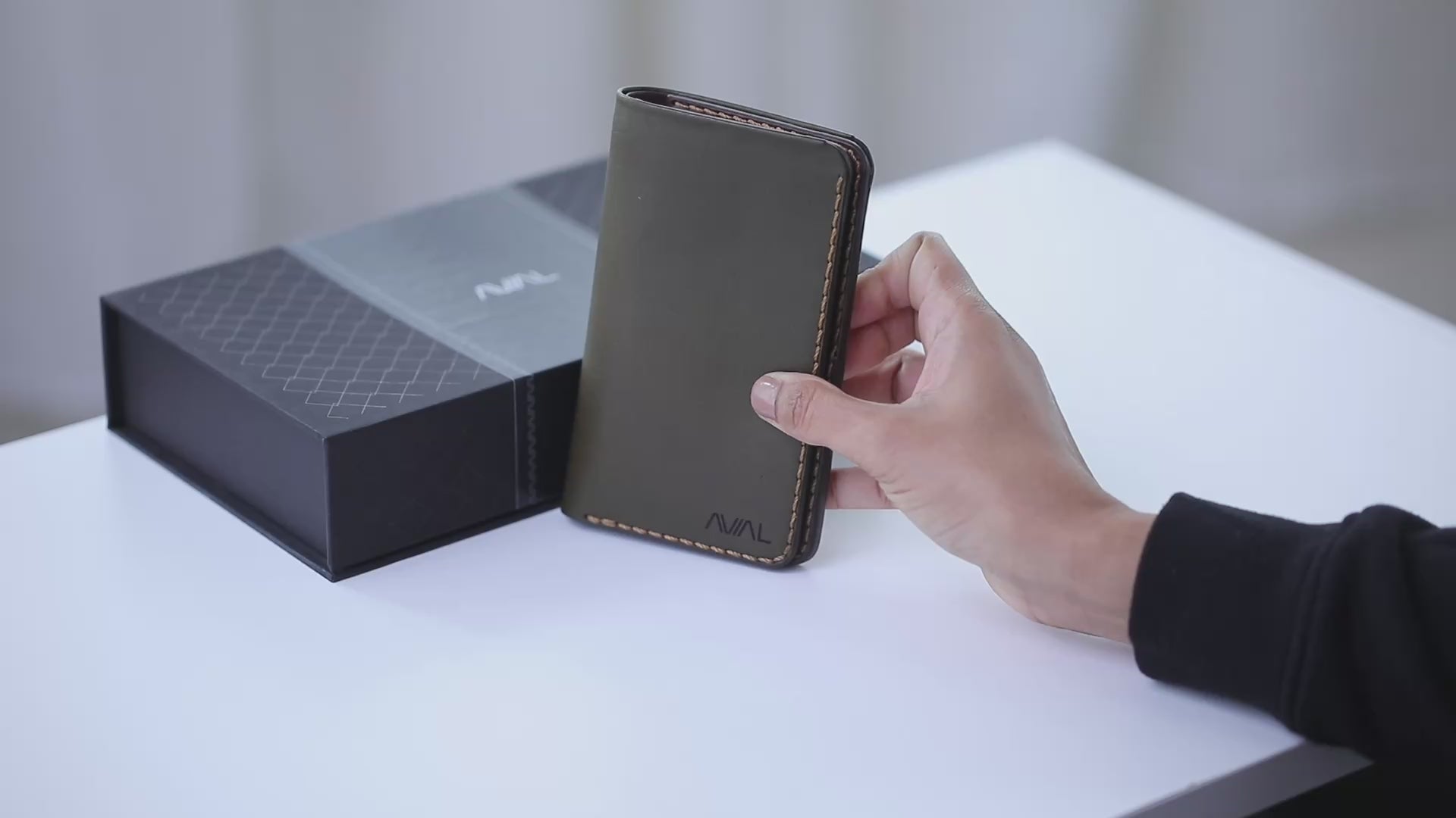 "Video demonstration of The Maverick Two-Tone Leather Long Wallet for Men, showcasing the long style, Olive Green and Brown dual-tone design, 10 card slots, and interior organization."